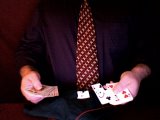 magician reveals restored card