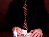 magician glues cards together