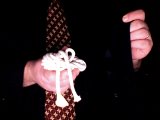 magician holds the rope