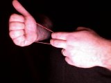 magician makes a fist