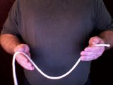 magician holds rope