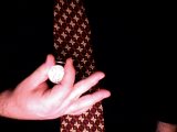 magician shows hidden coins