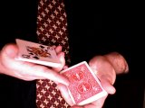 magician cuts the deck