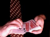 magician shows cards are mixed up