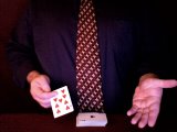 magician lifts an indifferent card